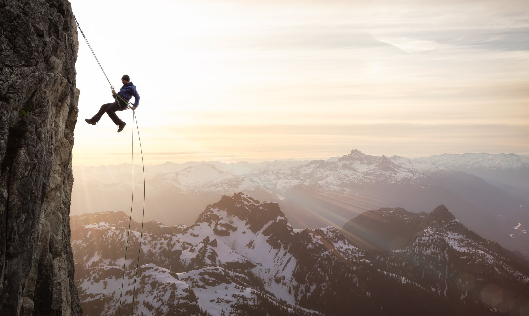 Man Climbing a Mountain 